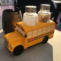 Cute salt and pepper holder shaped like a bus.  at Stacy's Diner in Koege
