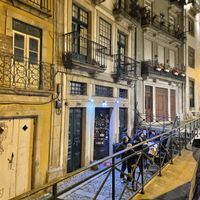 The center green door pushes open  at Casa da Horta in Porto