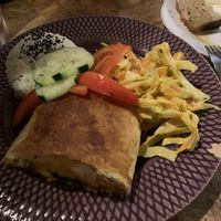 Great olives! Savoury pastry with tofu and veggies. Fresh and delicious coleslaw    at Casa da Horta in Porto