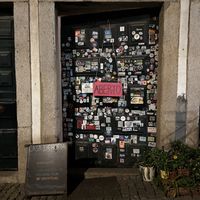 Big front door, small insidee  at Casa da Horta in Porto