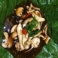 Three-flavored mushrooms steamed in banana leaf at Phuc An in Da Nang