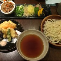 Vegetable tempura, toppings for the udon, broth, and the noodles at Omen Nippon in Kyoto