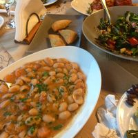 Giant beans, spinach salad without honey, tomato stuffed with rice and pies with wild greens at Taverna Babis in Crete
