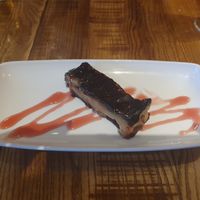Salted caramel billionaires gold bar with strawberry sauce at The Anderton Arms in Preston