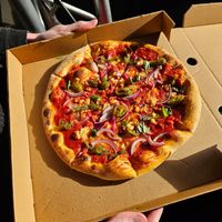 Mariana pizza with onion and jalapeños at Whitby Brewery in Whitby