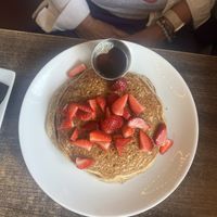 Banana Quinoa pancakes — added at strawberries on top   at Tryst Cafe in Chandler