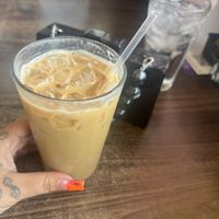 Iced latte with oat milk add hazelnut   at Tryst Cafe in Chandler