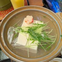 Silken tofu, cooking at the table at Saga Tofu Ine (Main Branch) 嵯峨とうふ 稲 本店 in Kyoto