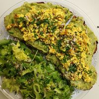 Avocado toast with scrambled tofu at Why Not Us Coffee in Marseille