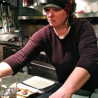 Conversation with Cook Karianne (seen here) and Chef Patterson added dimension to our five-course dinner at Sutra. at Sutra in Seattle