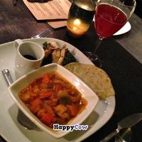 Marina d'Chioggia Squash-Chantennay Carrot-Celery Root-Ber Ber Ragout with Nigella Dosa, Evergreen Huckleberry-Urfa Biber Chutney, Grilled Abalone Mushrooms and Steamed Kale at Sutra in Seattle