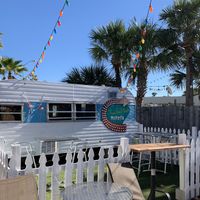 In back patio you can find 2 or more joints converge for a nice relaxing outdoor dining and entertainment venue. at Evolve Modern Vegan Kitchen in Daytona Beach