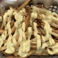 Fries with beer cheese  at Evolve Modern Vegan Kitchen in Daytona Beach