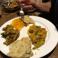 Saffron rice, naan bread and two curries.  at Goa Indian Fusion in Gold Coast