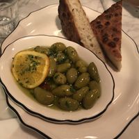 Olives in hot oil and focaccia  at Radis in Montreal