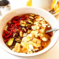 Porridge with nuts and berries and maple syrup  at The Fields Beneath in North West London