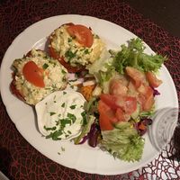 Peppers stuffed with potato cheese filling, served with salad, cacik and flatbread  at Posthörnle in Schwabisch Hall