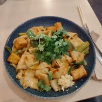 Homemade spicy noodles with tofu. Tasty! Beware that it's BATHED in oil. Maybe they can do with less. at Kinabolle in Oslo