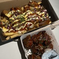 curry wurst fries and wings  at Mad Mad Vegan - Chueca in Madrid