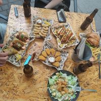 tacos, non-octopus rings, bavarian sausage, burger with vacon, non-chicken wings, caesar salad at Mad Mad Vegan - Chueca in Madrid