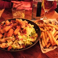 Salad and french fries at Mad Mad Vegan - Chueca in Madrid