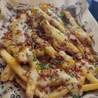 Vacon and cheese fries at Mad Mad Vegan - Chueca in Madrid