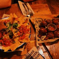 Loaded Nachos & Cauliflower Wings  at Mad Mad Vegan - Chueca in Madrid