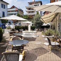 Outdoor seating at Wellness Hotel Roessli in Weggis