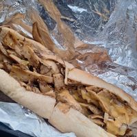 Seitan cheese steak, on the right with cheese wiz at Savory Leaf Cafe in Trenton