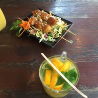 Satay starter, orange and ginger tea, summer breeze shake  at Tiato in Berlin