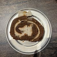 Mmmm pumpkin roll cake. So good!   at Pythagoras Conscious Food Philosophy in Houston