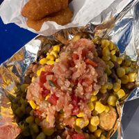Hot water cornbread and fried okra bowl at Sassy's Vegetarian Soul Food in Austin