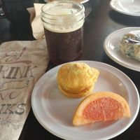 Nitro cold brew, vegan biscuit and "egg" sandwich & vegan blueberry/earl grey scone at Drunken Monkey Coffee Bar in Orlando