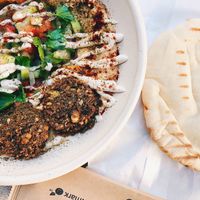 Hummus bowl with Israeli salad and falafel.  at Simply Hummus Bar in Darlinghurst
