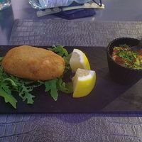 Polpettone di farro in panatura di sesamo con hummus alla paprika at Ser Bacco in Rome