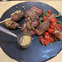 Tris di redefine meat: tagliata 3D, salsiccia e polpette  at Ser Bacco in Rome