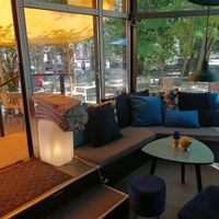 Gorgeous indoor and outdoor seating at KIRAS - Pylimo in Vilnius