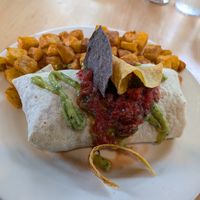 Vegan burrito with home fries at Sunny Point Cafe in Asheville