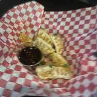 Sorry for the terrible picture- but kimchi potstickers  at Osoyami Bar and Grill in Honolulu