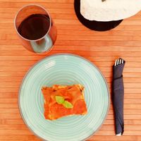 Vegan Lasagna and red local wine 😍 at Jolly Roger in Lecce