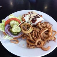 vegan BBQ ranch chicken burger with onion strings at Saturn Cafe in Santa Cruz
