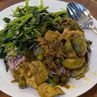 Three dishes on rice at So Vegan - Gateway Ekkamai in Bangkok