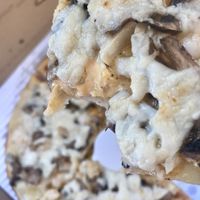 Cheeze pizza with mushrooms and ninja sauce. at Tomato Joe's Pizza Express in Valencia