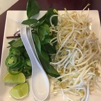 Basil, lime and sprouts for the pho  at vPho in Newark