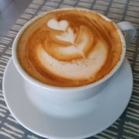 Latte with Califia farm oat milk at Dauns in East London