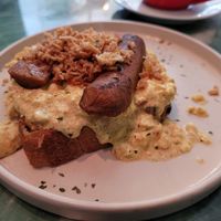 Scramble on sourdough bread with seitan sausage at Dauns in East London