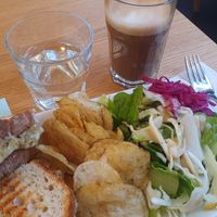 Grilled toast with crisps and salad- delicious and filling! at Delivore in Stockholm