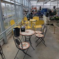 Indoor dining area in greenhouse. at Samascott's Garden Market in Kinderhook