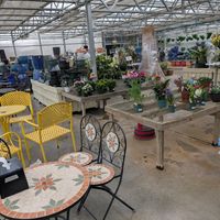 Indoor dining area in greenhouse. at Samascott's Garden Market in Kinderhook