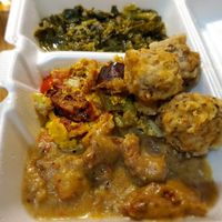 The best vegan steak and gravy I ever had with fried mushrooms, eggplant parmesan, and greens 😋 at Daisy's Cafe II in Hazel Crest